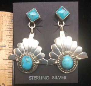 Turquoise set in sterling silver post earrings