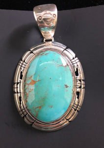 Turquoise with matrix sterling silver pendant